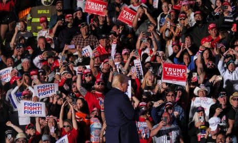 Donald Trump Makes a Theatrical Return to Butler, Scene of an Assassination Attempt logo